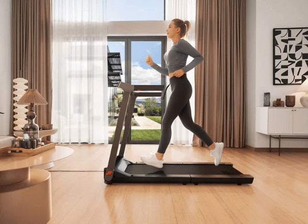 King Smith WalkingPad G1 Treadmill's running surface, emphasizing the double shock-absorbing belt and foldable side supports for safety.